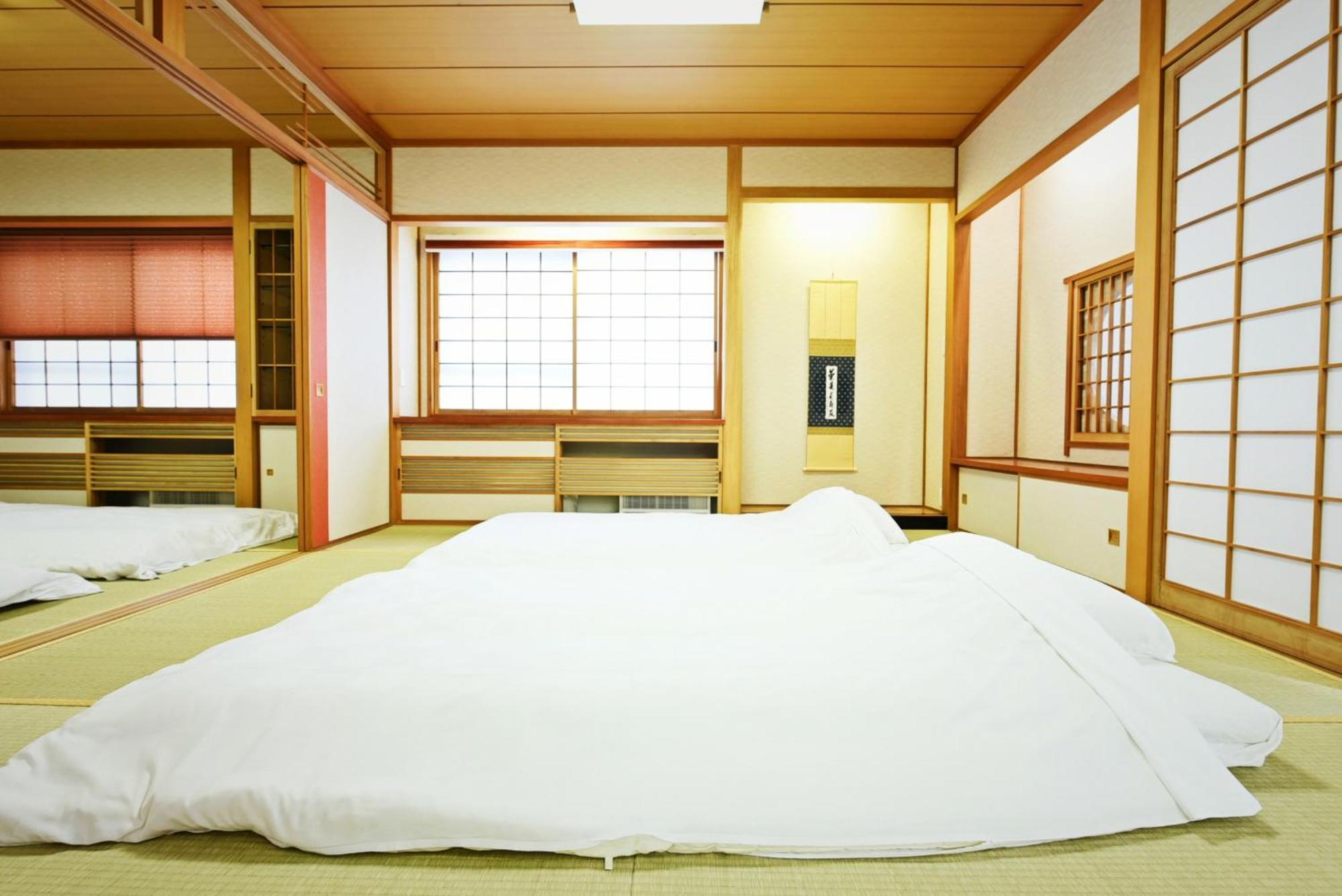 Hostel Pleasure Maruyama Sapporo Pokoj fotografie